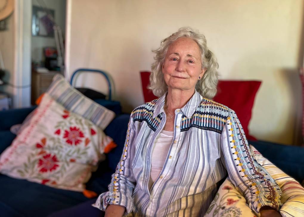 Lee Mitchell, pictured sitting in her home in California, plans to volunteer as a driver and host for women who travel to California from other states where the procedure is banned.