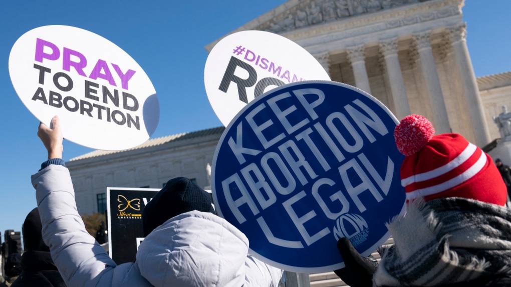 Pro-life activists counter-demonstrate as pro-choice activists participate in a "flash-mob" demonstration outside of the US Supreme Court on January 22, 2022 in Washington, DC.